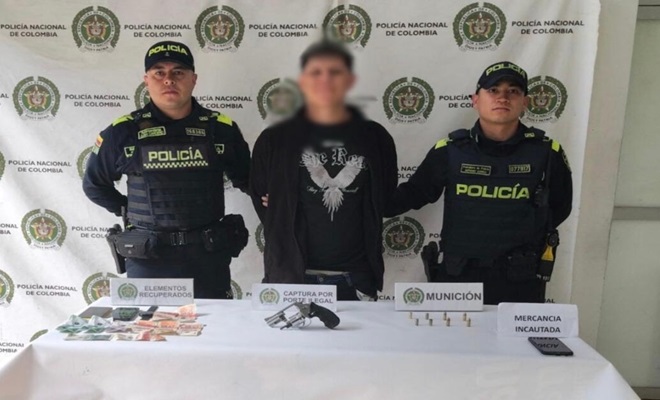 Capturado con arma de fuego y dinero incautado