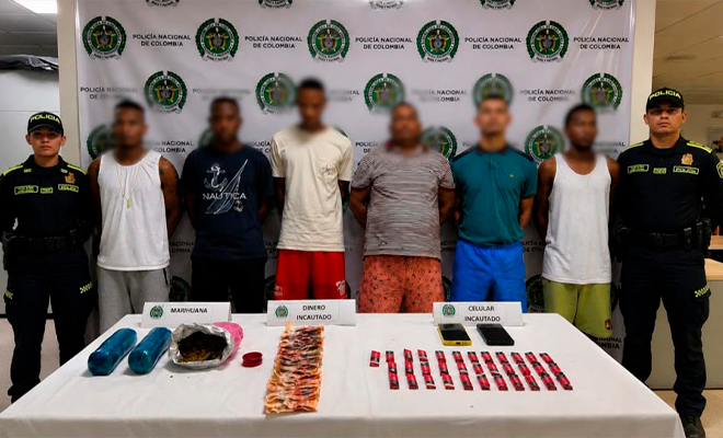 Presuntos integrantes de la estructura delictiva "Ladrillera", son custodiados por la Policía Nacional.