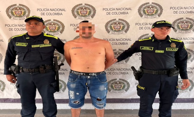 Dos policías, 1 capturado - alias pelicano. 