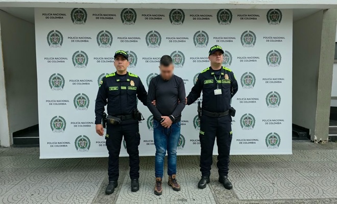 policías y capturado en Manizales 
