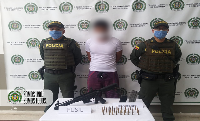 capturado con fusil